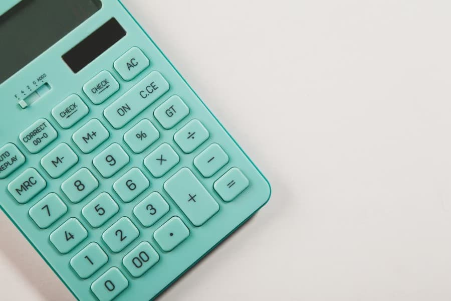 Mint calculator on white desk